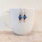 עגילים טורקיז נקודות סגולות