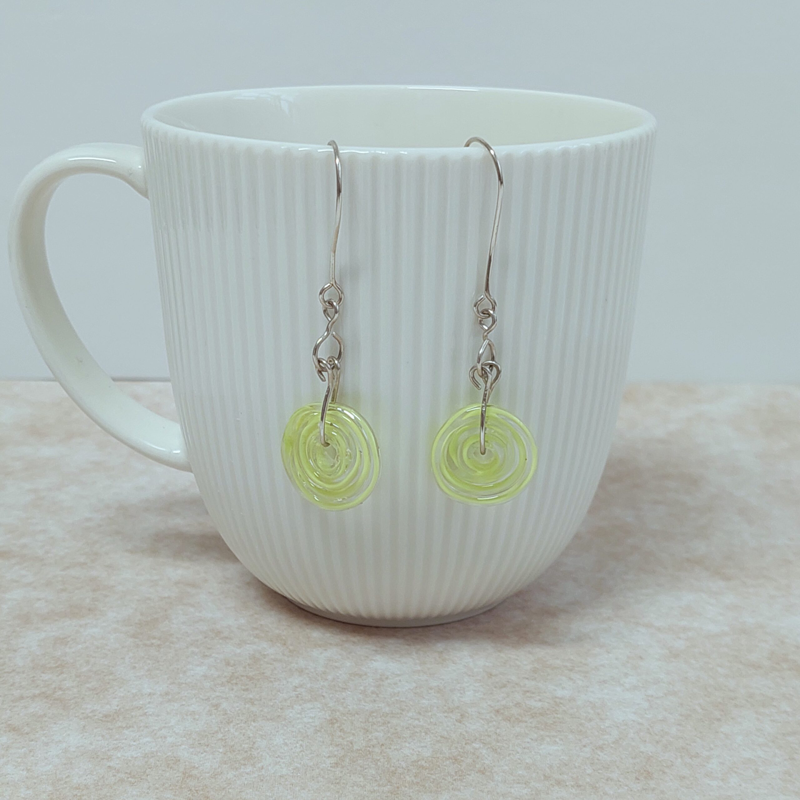 עגילים דיסקים ירוק בהיר